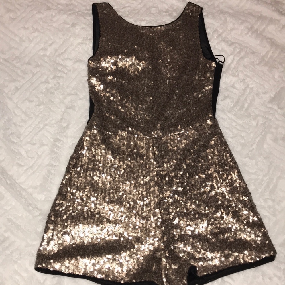 Gold and black romper